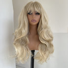 Long wow hair and bangs of long wavy gray blonde hair