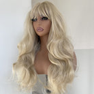 Long wow hair and bangs of long wavy gray blonde hair